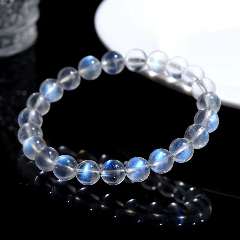 Natural cream body blue moonlight crystal bracelet showing crystal elements and simple construction
