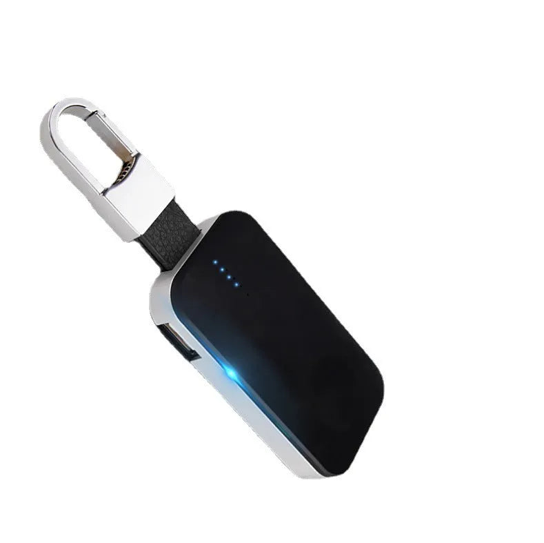 Black Apple Watch keychain power bank showing wireless charging surface and compact size