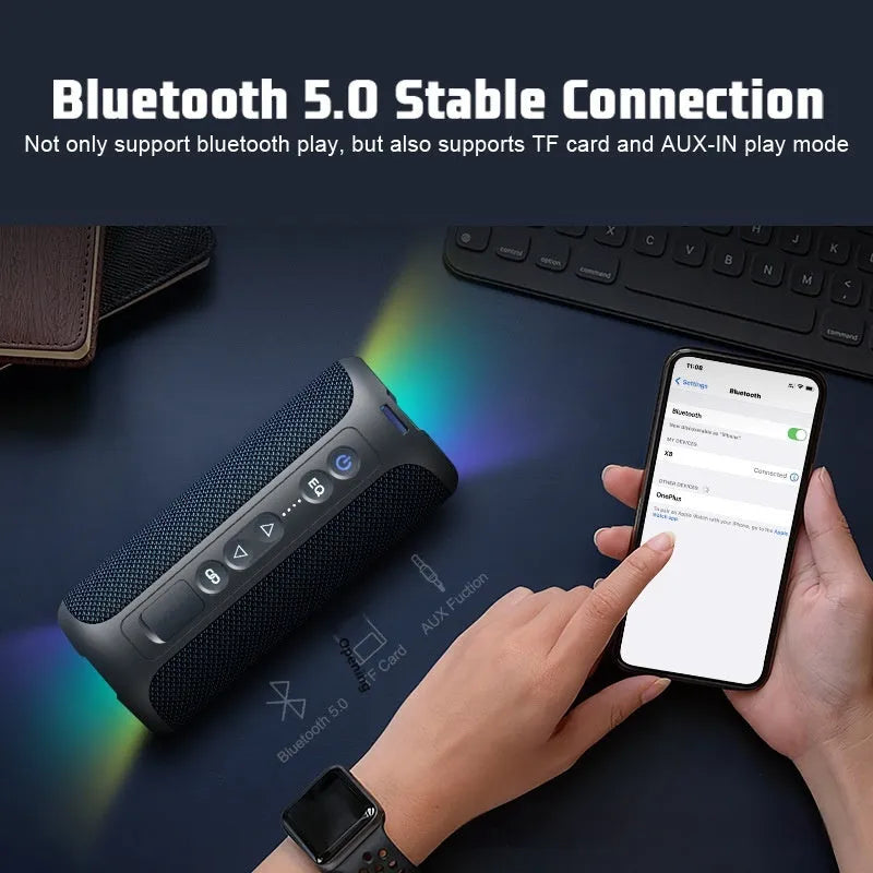 Black and blue fabric wireless Bluetooth speaker with LED lighting and control buttons