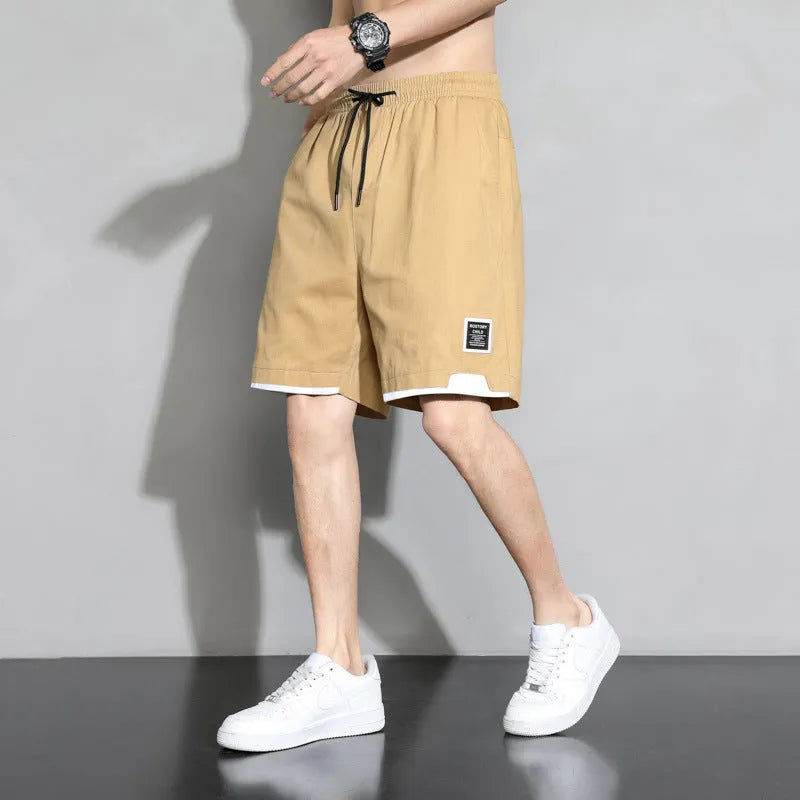 Boys' plus size cotton shorts in overalls style, shown in black, khaki and white.