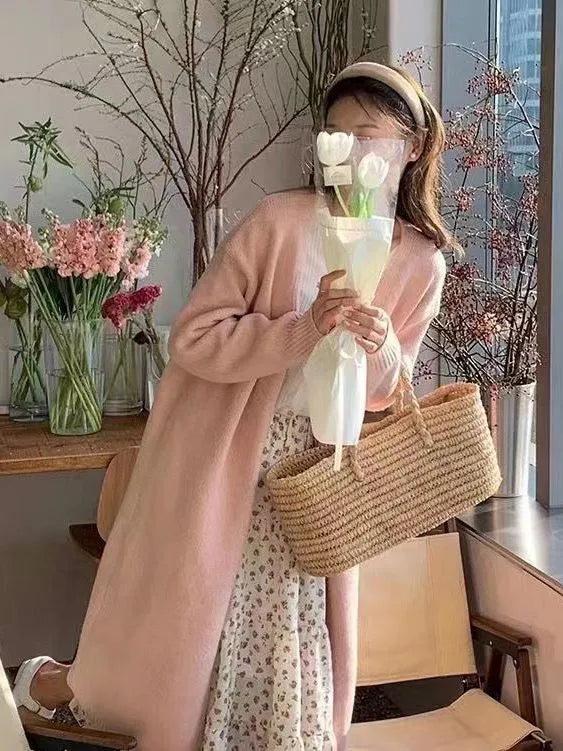 Women's medium length knitted cardigan in khaki colour with V-neck and long sleeves