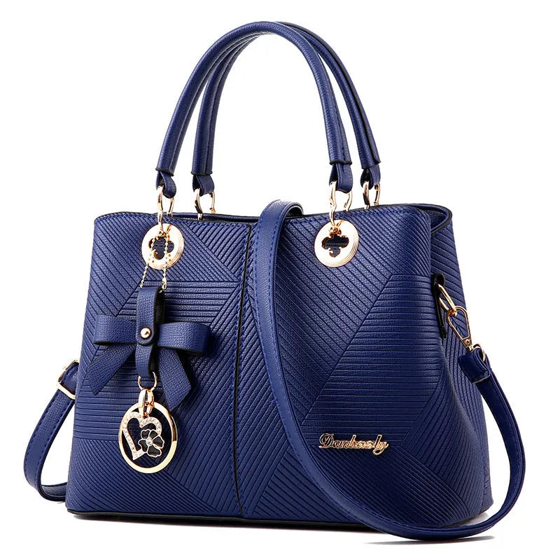 Retro style PU crossbody handbag with zip closure in black, blue, grey, pink, or red.