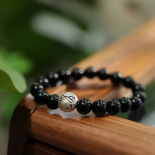 10mm black agate bracelet with sterling silver detailing in Chinese ethnic design style