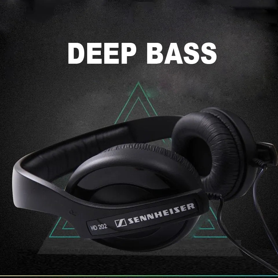 Black head-mounted monitor headphones with over-ear cups, a built-in microphone, and a long cable with a 3.5mm plug.