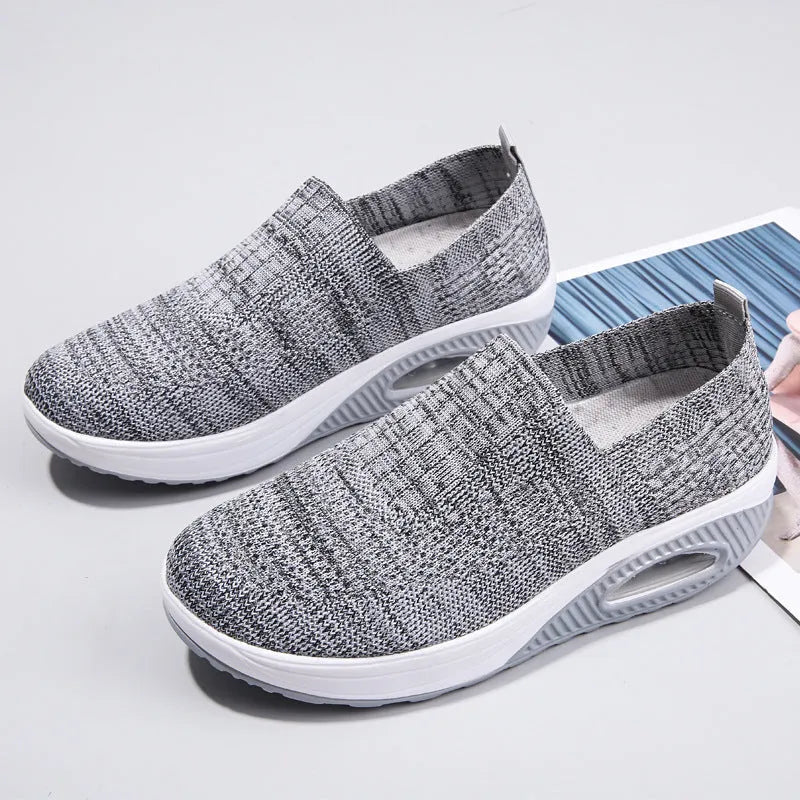 Women's mesh outdoor running shoes in beige colour with round toe design and air cushion