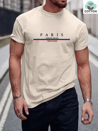 Man wearing a heavy loose-fit pure cotton T-shirt with a letter print on the chest in a casual setting.
