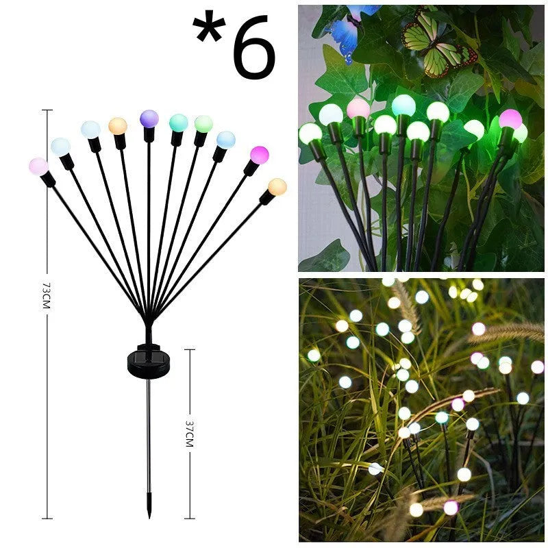 Solar-powered LED ground spike garden light with multiple heads and stainless steel soil plug.
