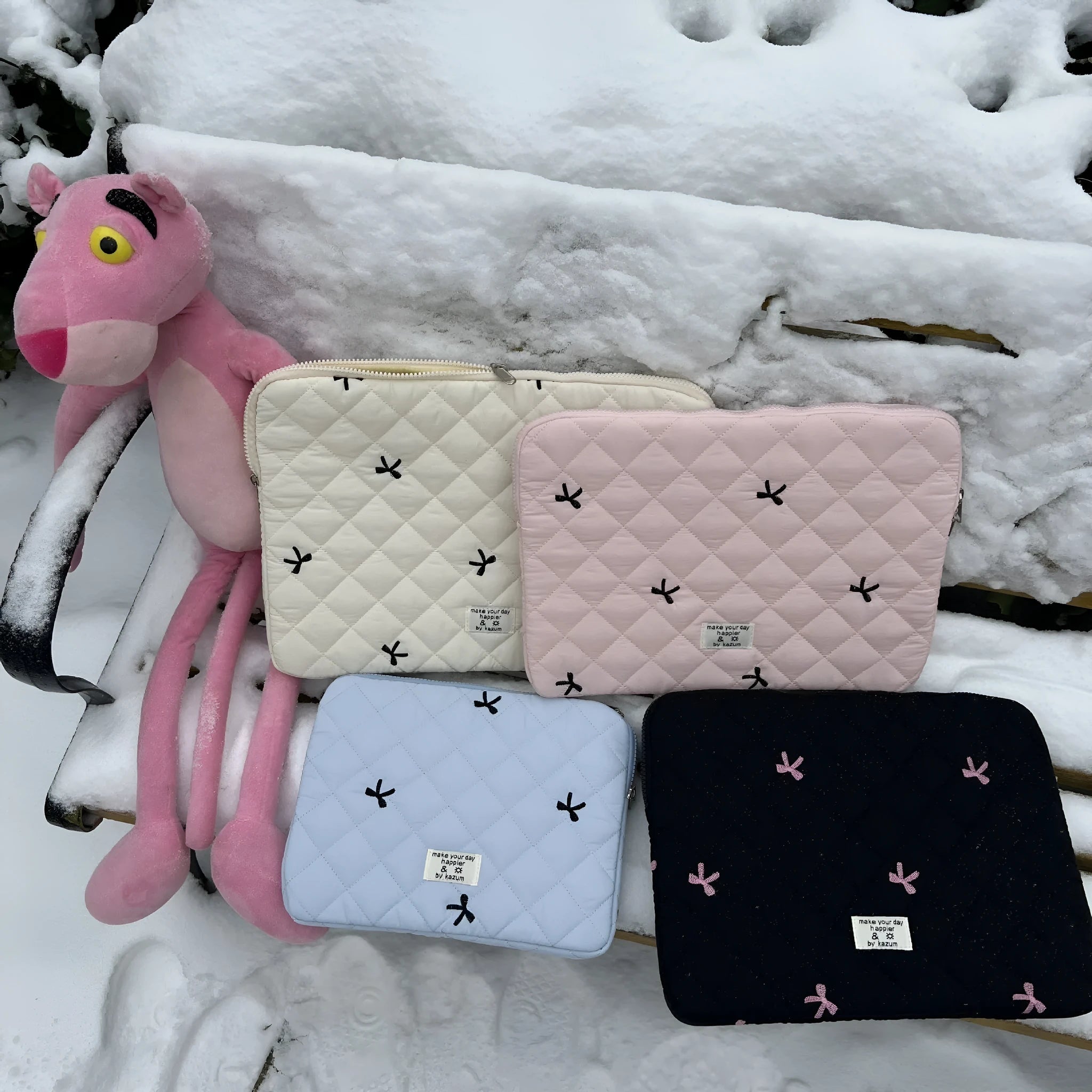 Laptop sleeve bag with rhombus embroidered bow in light blue colour