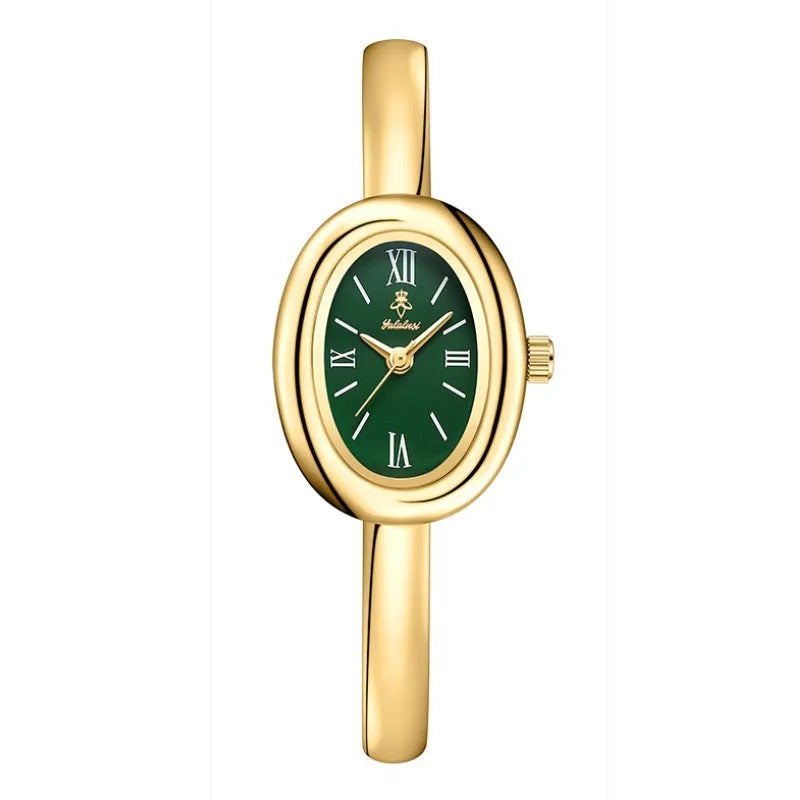 Women's oval retro quartz watch with 8mm thickness showing gold and silver colour options with spiral patterns
