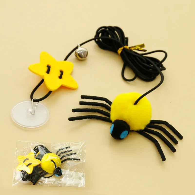 Cat hanging door toy with elastic rope, feather, bell and spider attachment in red colour
