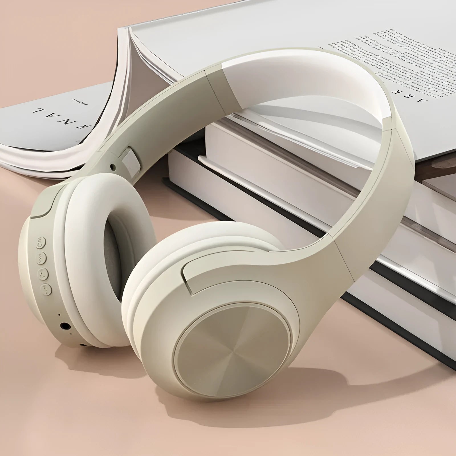 Creative design wireless Bluetooth headset in ivory white, shown in a head-mounted wearing style.