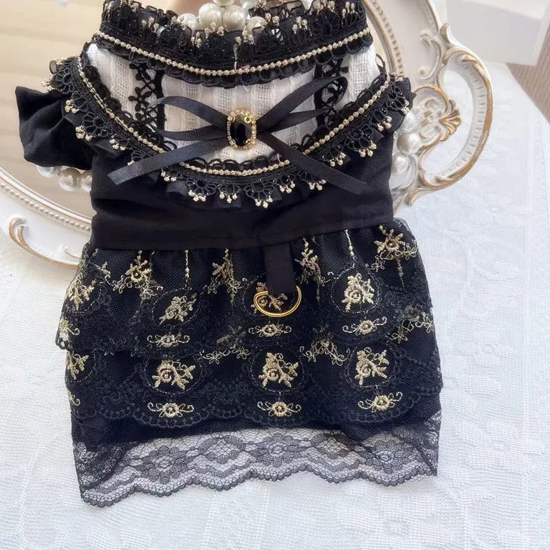 Golden gothic lolita-style skirt costume on a small dog, showing princess design.