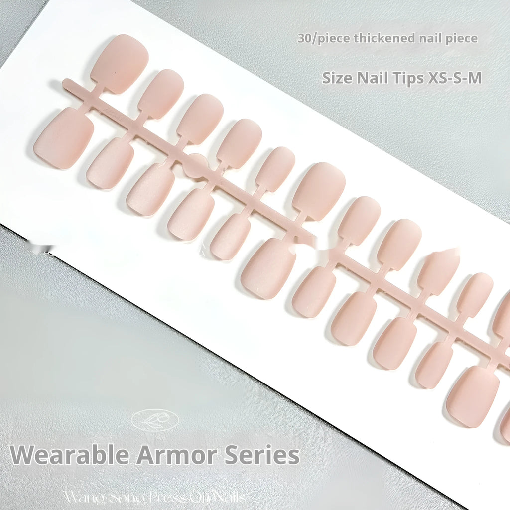 Set of frosted velvet Cat's Eye false nail wraps in short ladder sizes XS, S, and M on a display stand.