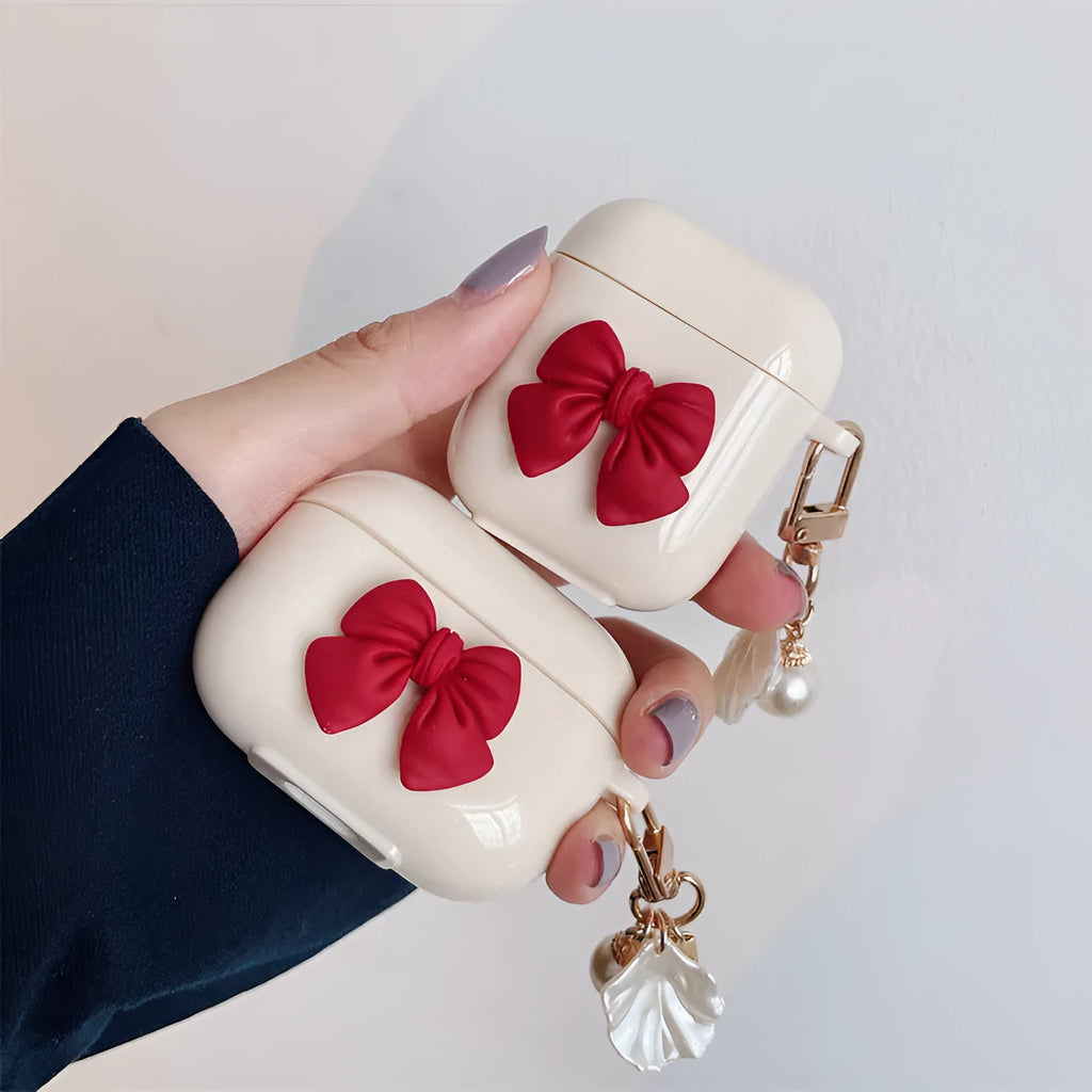 Beige red tpu protective case for AirPods Pro with a bow design on the shell.