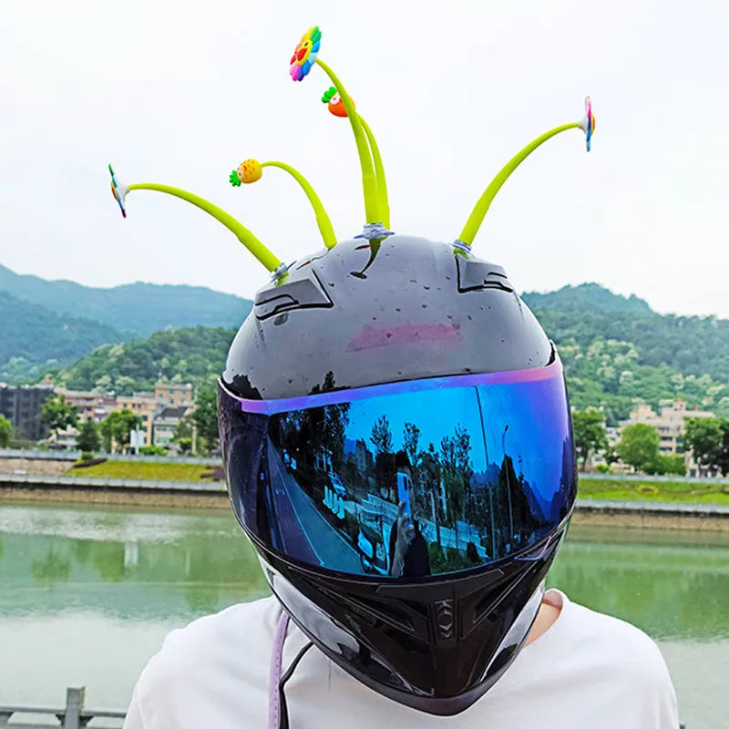 Yellow silicone sunflower decoration with a suction cup mount for helmets