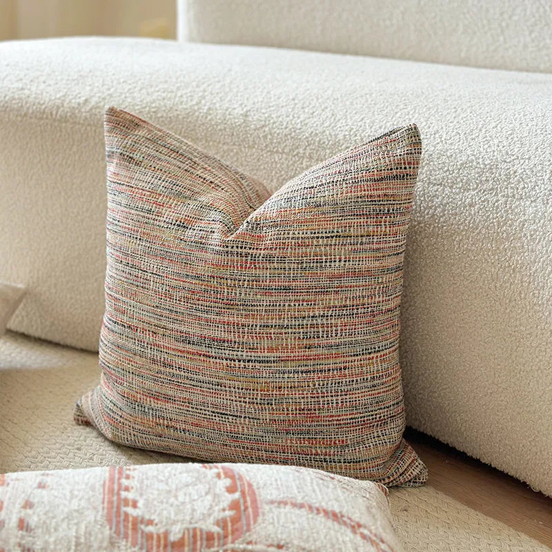 American-style Jacquard sofa backrest cushion with yarn-dyed paisley pattern in amber colour variations