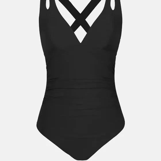 Solid colour one-piece cross shoulder strap swimsuit with nylon lining in image colour