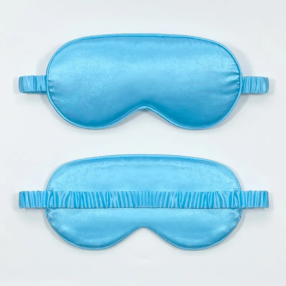 Reversible rayon satin sleep mask in a choice of colours with an elastic headband.