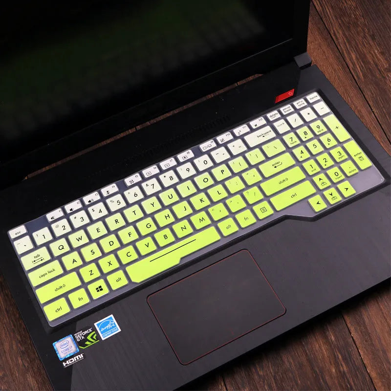 ASUS Flight laptop keyboard protective film cover shown in gradient blue on a laptop