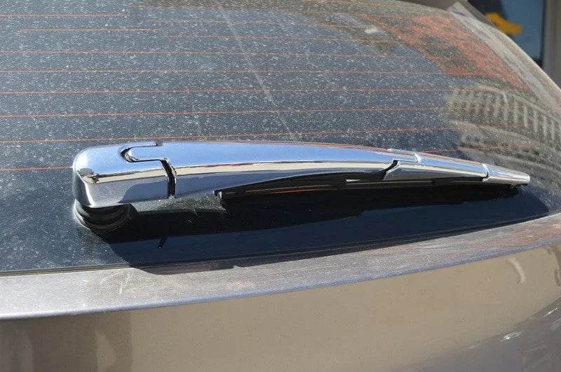 Set of four silvery ABS plastic rear window wiper trim covers for a Hyundai car.