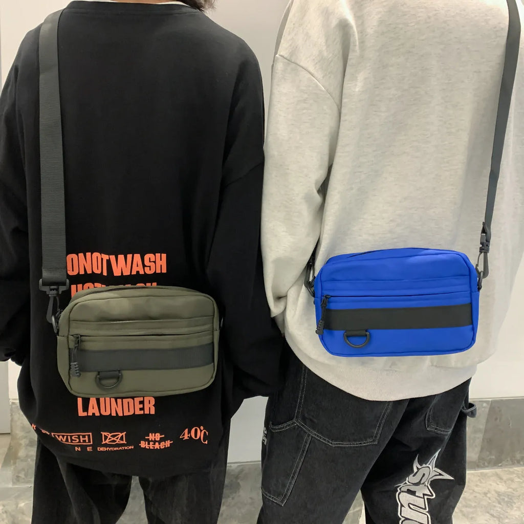 Men's nylon messenger bag with crossbody strap in street trend style showing sewing thread detailing