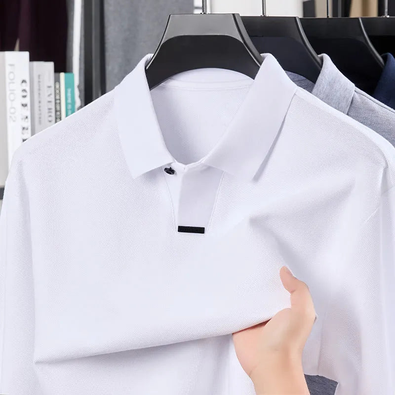 Men's grey loose fit cotton polo shirt with lapel collar and long sleeves on a hanger