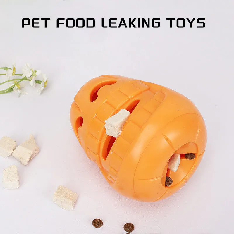 Orange Halloween pumpkin shaped interactive dog chew toy with a treat dispensing funnel.