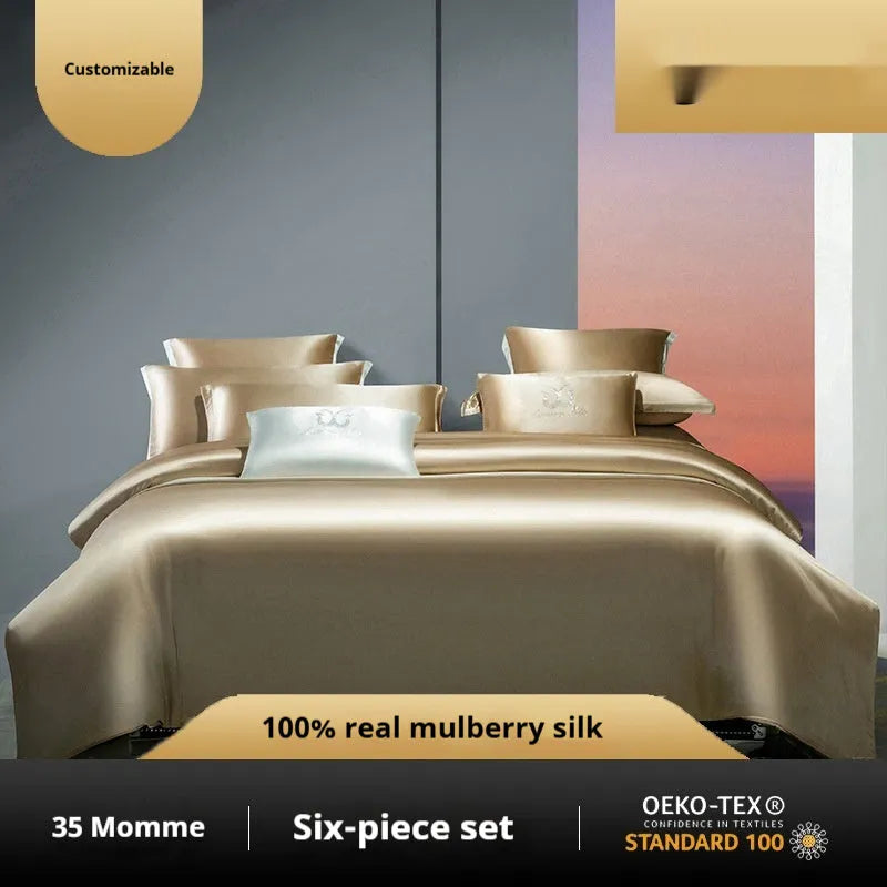Silk four-piece quilt cover set in a solid colour, shown in a bedroom setting on a bed.