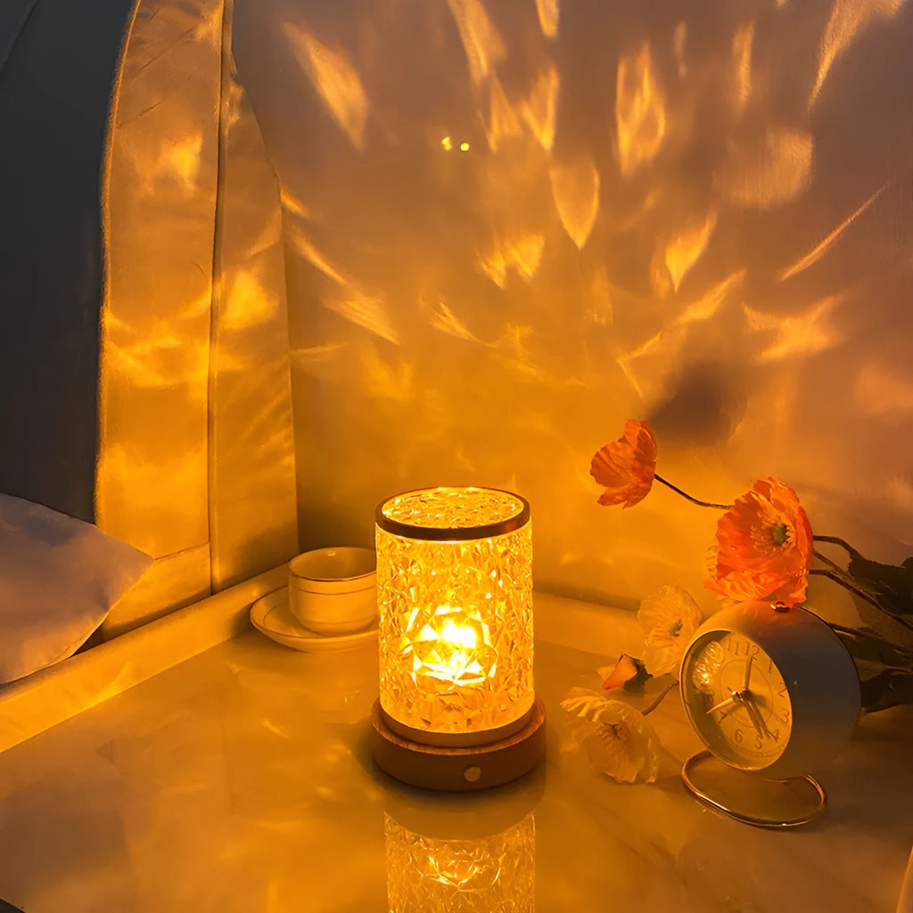 Small rotating water ripple night light with acrylic shade on solid wood base