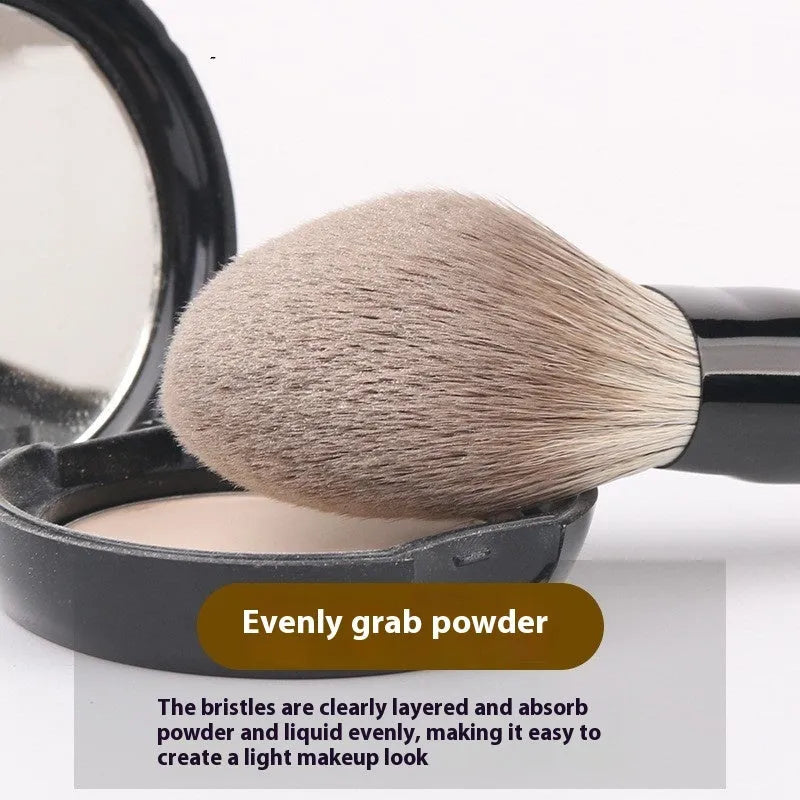 12-piece makeup brush set with wooden handles and a grey PU travel bag