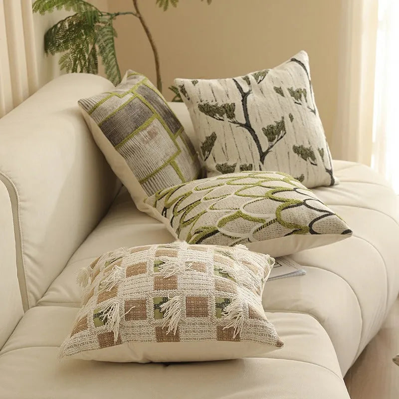 Jacquard floral pattern cushion cover in a retro colour, 45cm square, on a sofa.