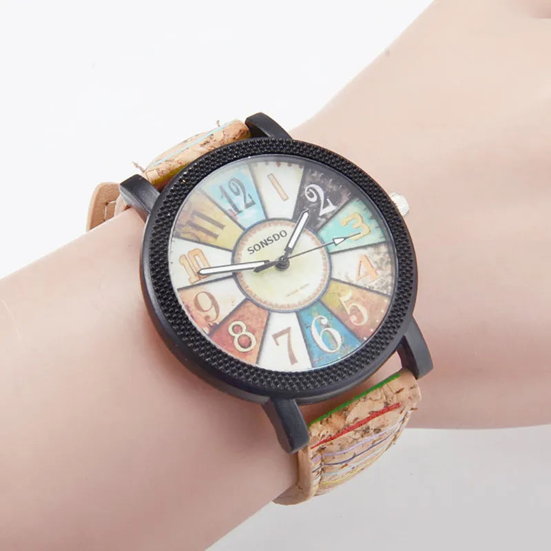 Women's vintage-style quartz watch with brown leather strap and 37mm round dial
