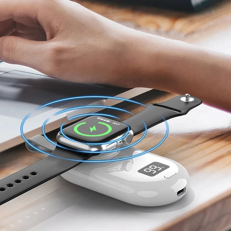White V5 watch wireless power bank with Type-C port next to included USB cable