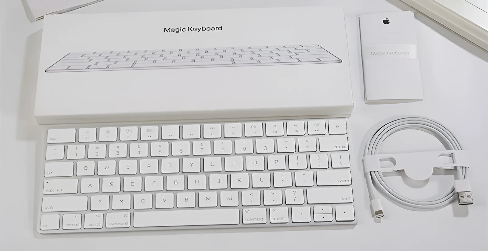 Apple G6 Bluetooth wireless keyboard in white with aluminium construction and multimedia keys