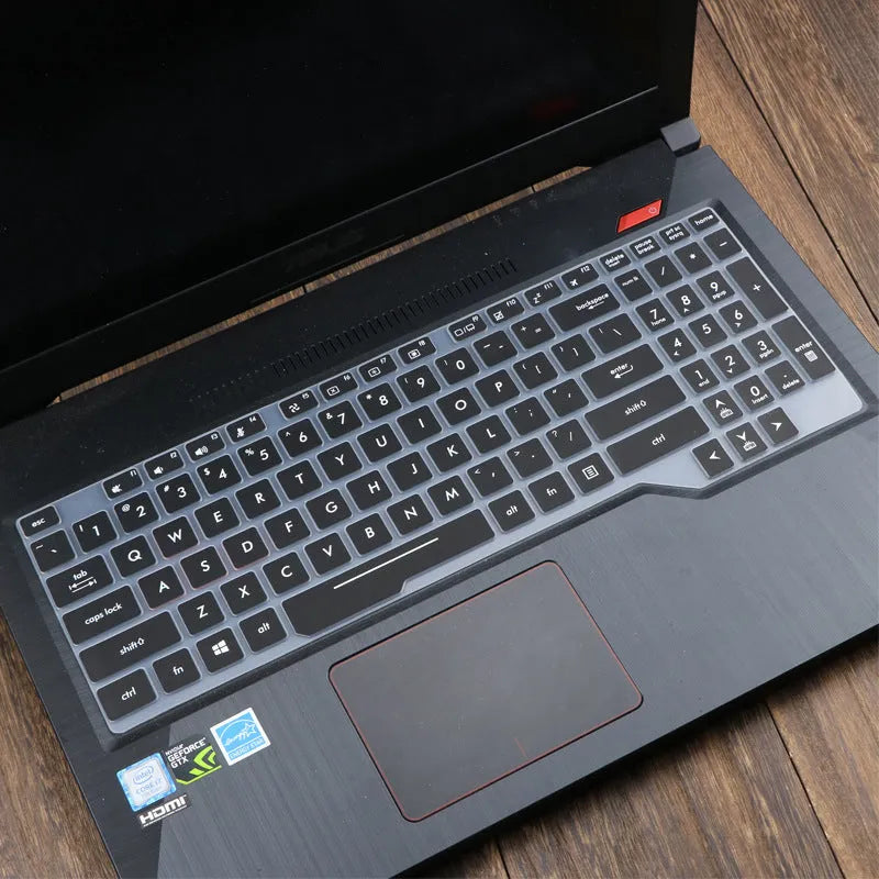 ASUS Flight laptop keyboard protective film cover shown in gradient blue on a laptop