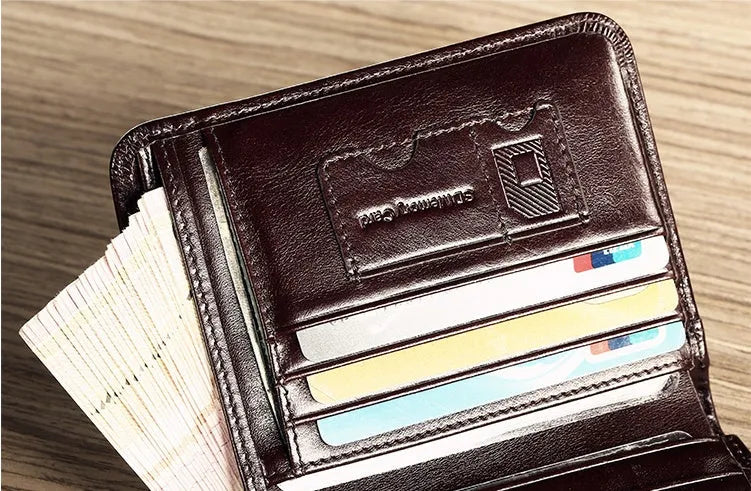 Men's leather wallet showing internal organisation compartments for cards, cash and coins