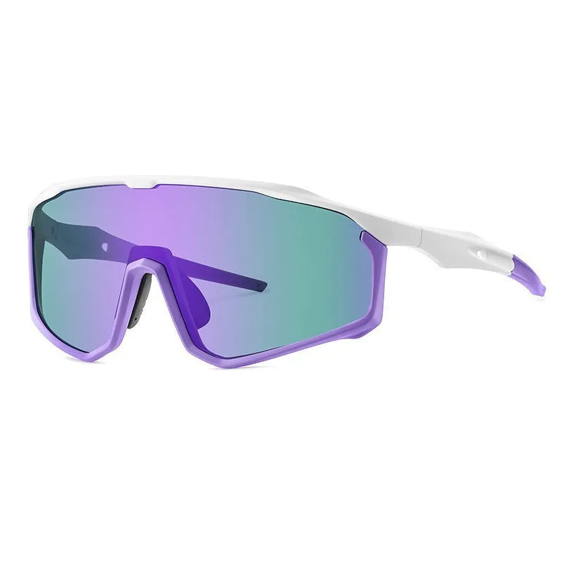 Full-frame mountaineering goggles for climbing with colourful UV-protective lenses on a black background.