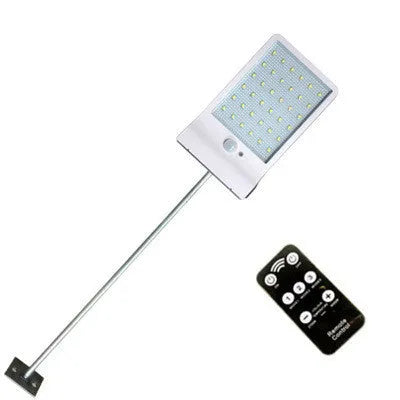 Black and white outdoor solar-powered garden light with IP65 waterproof rating for courtyards and balconies.