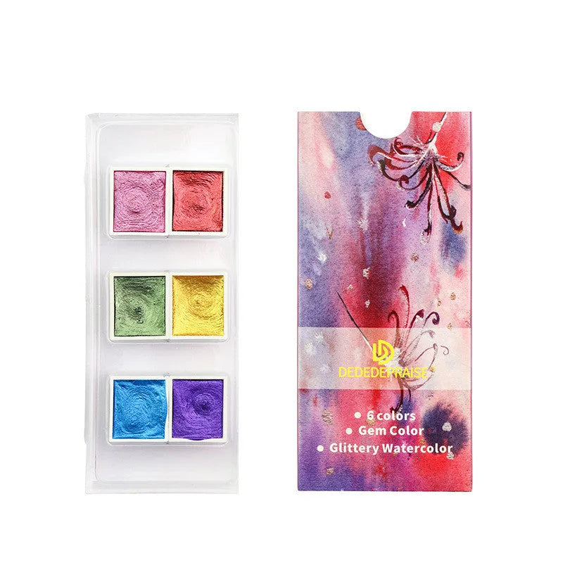 Box of solid watercolour pigment cakes in gem, pearl, or starlight colours for painting and nail art.