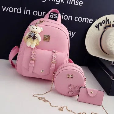 Women's 3-piece leather bag set with floral designs including backpack, shoulder bag and card wallet