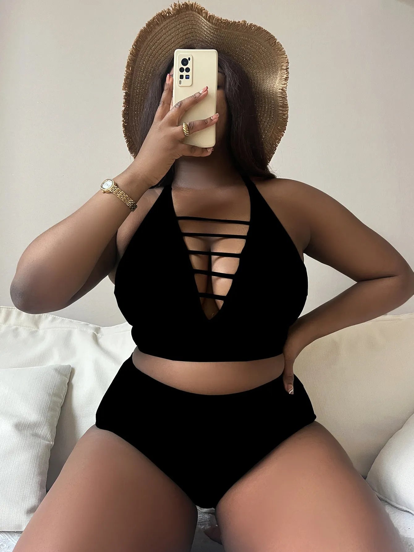 Plus size black halter bikini with adjustable cross straps and high waist briefs