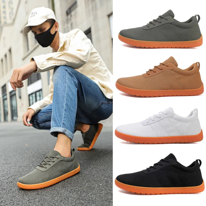 Men's low top walking shoes in Flyknit with non-slip rubber sole, shown in black colour with lace-up front.