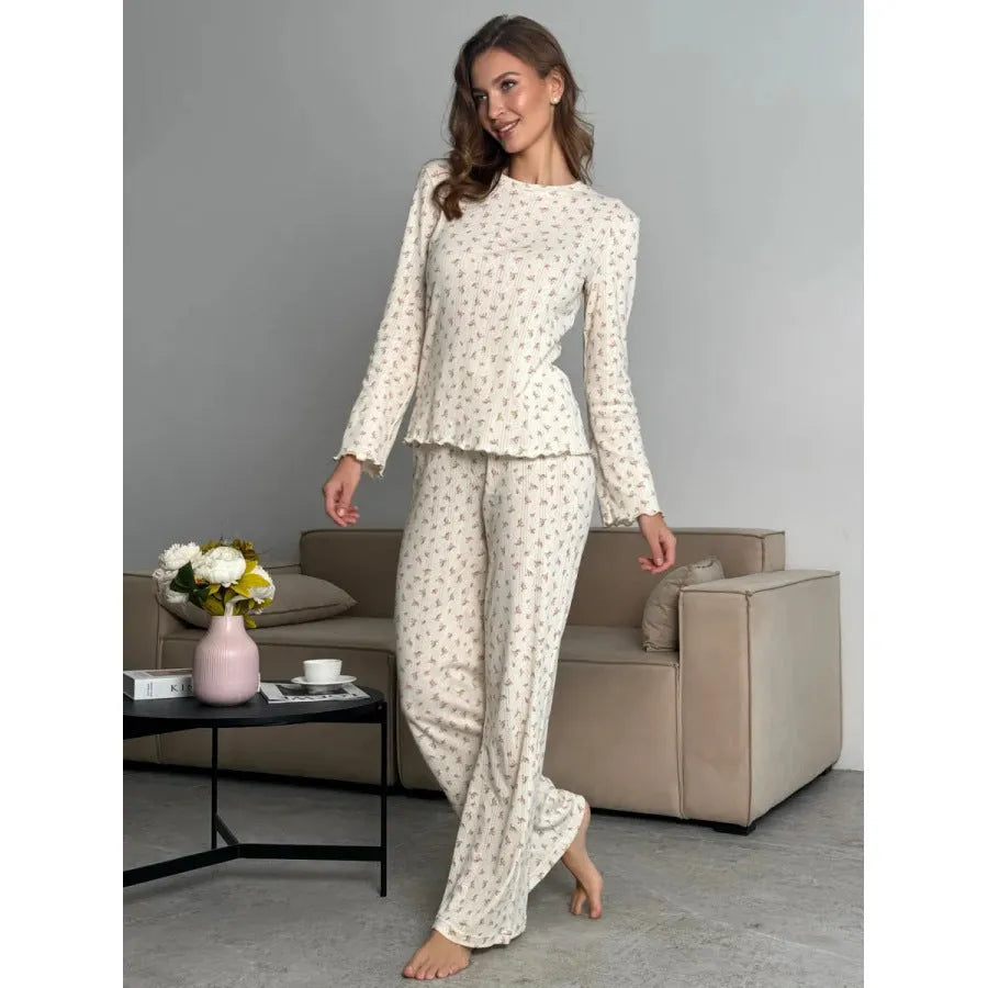 Women's white floral print lounge suit with bell sleeve top and wide leg trousers