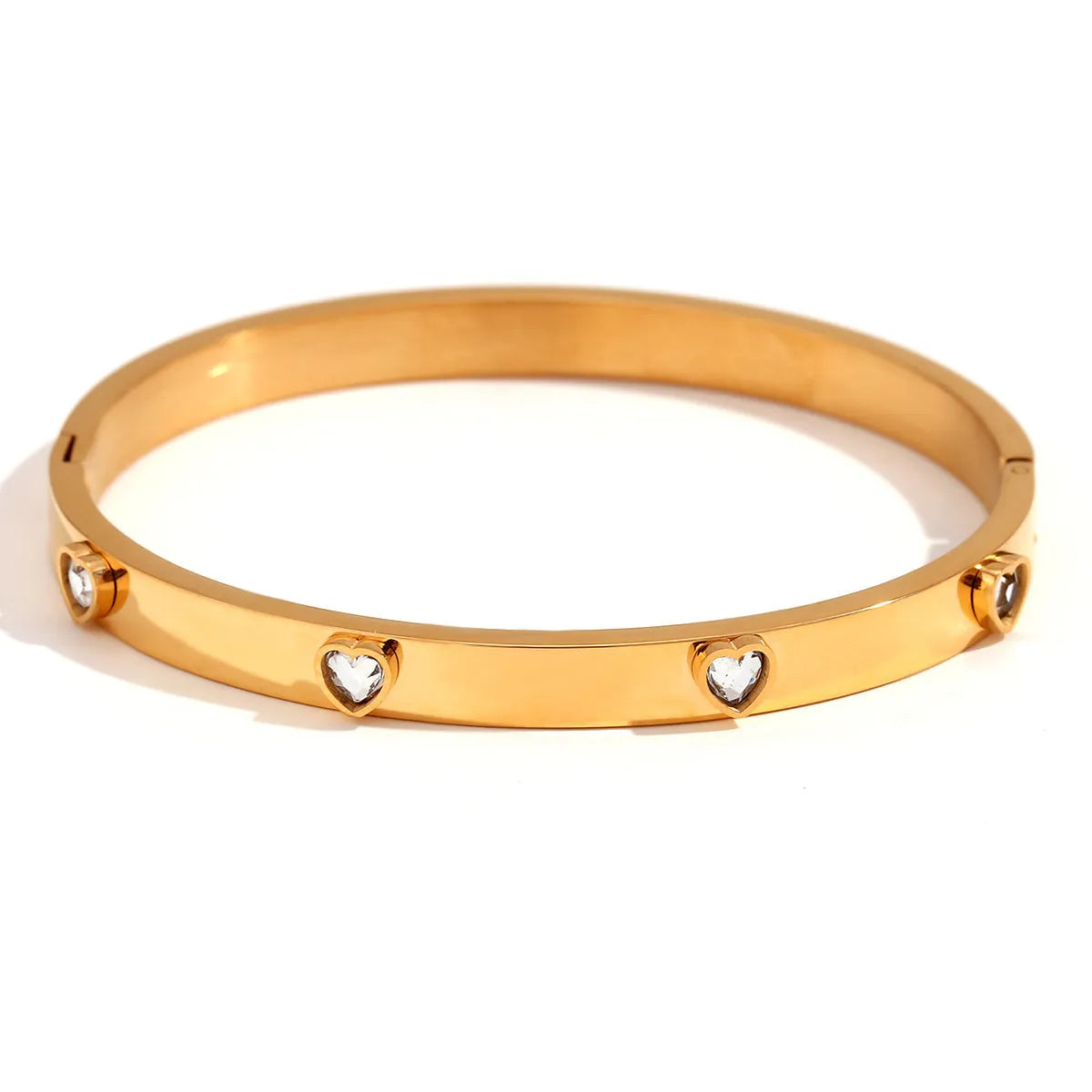 Stainless steel women's bracelet with micro-inlaid peach heart design in electroplated golden finish