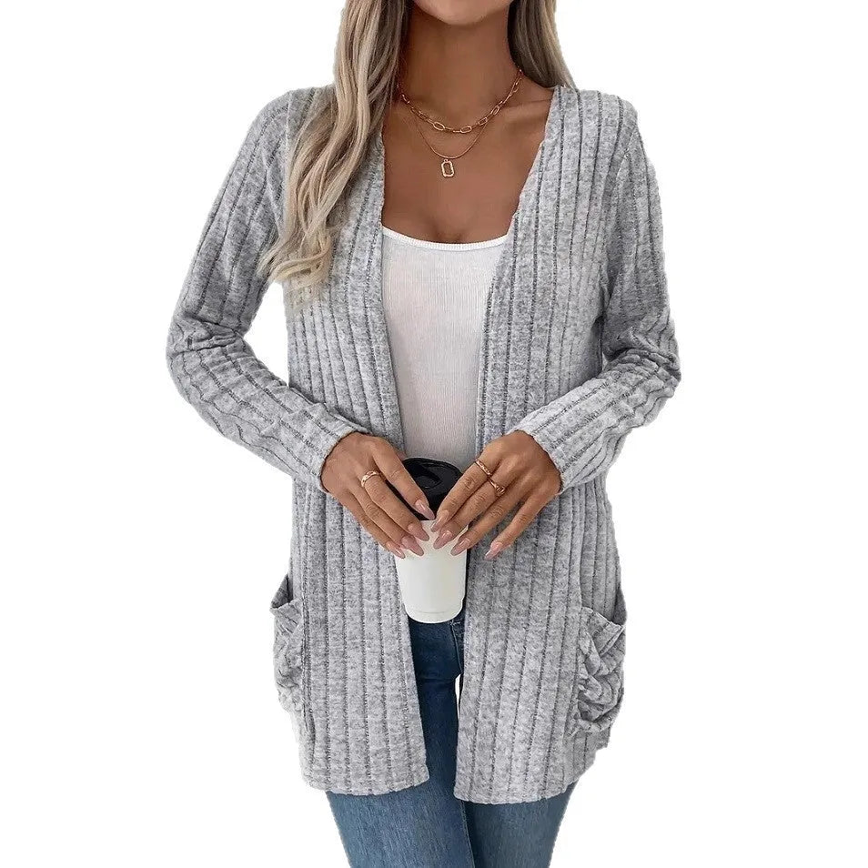 Solid color long sleeve cardigan knitwear with pockets in Grandma Grey or Black polyester blend loose fit