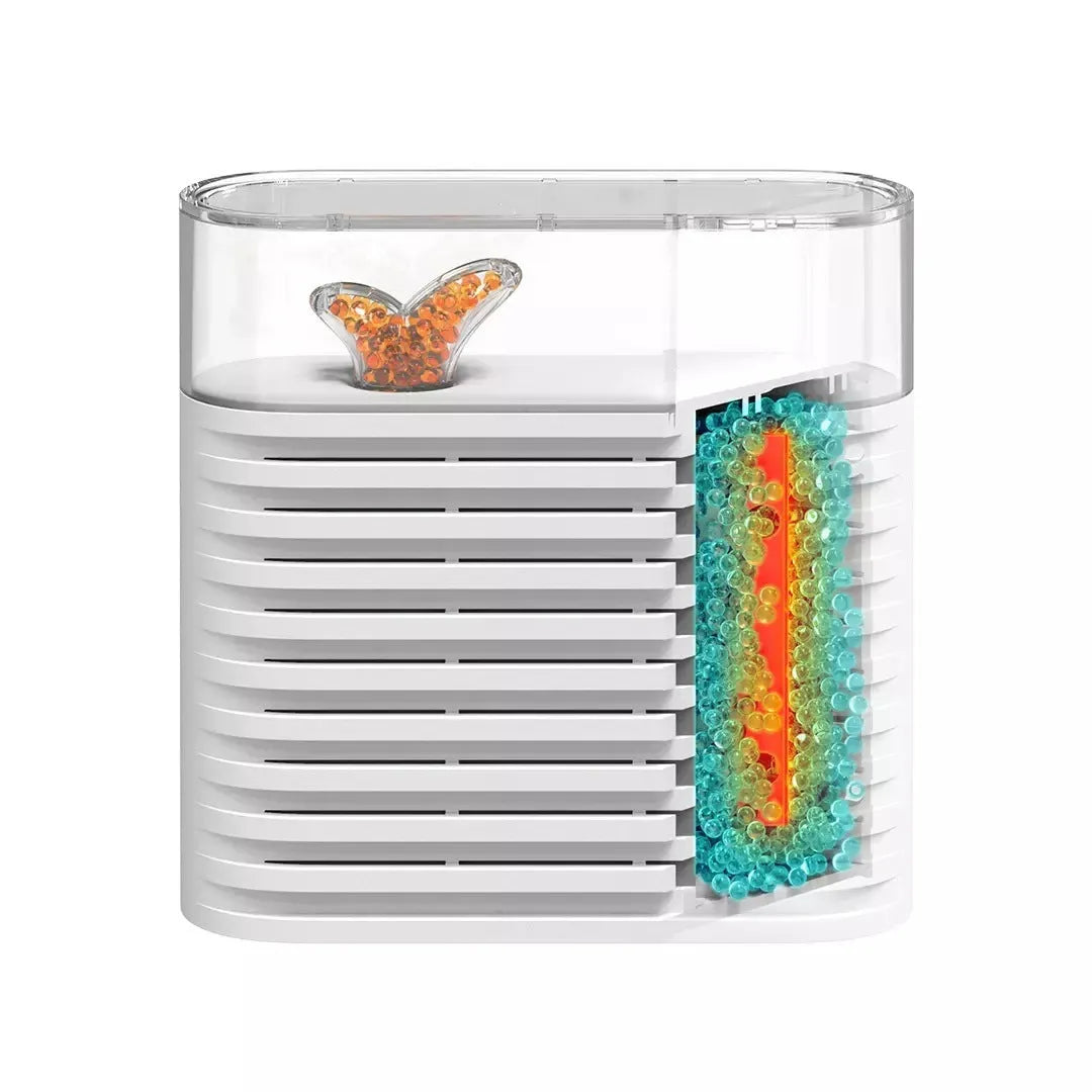 White reusable electric cabinet dehumidifier box with transparent geometric top showing orange silica gel beads inside.