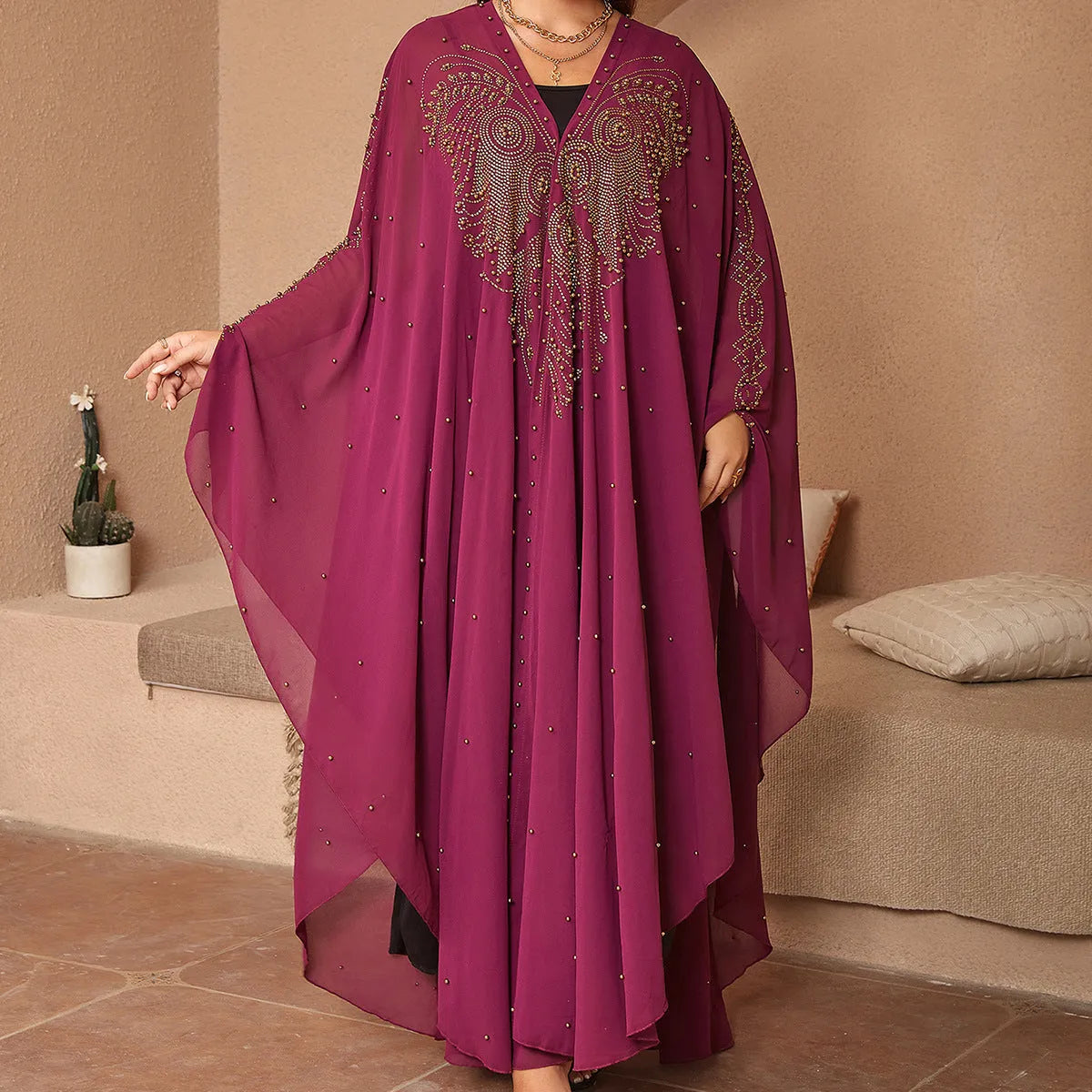 Purple chiffon shawl with rhinestone beading along edge showing draped styling