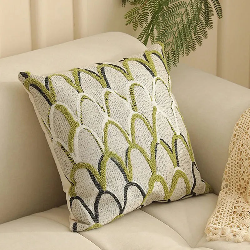 Jacquard floral pattern cushion cover in a retro colour, 45cm square, on a sofa.