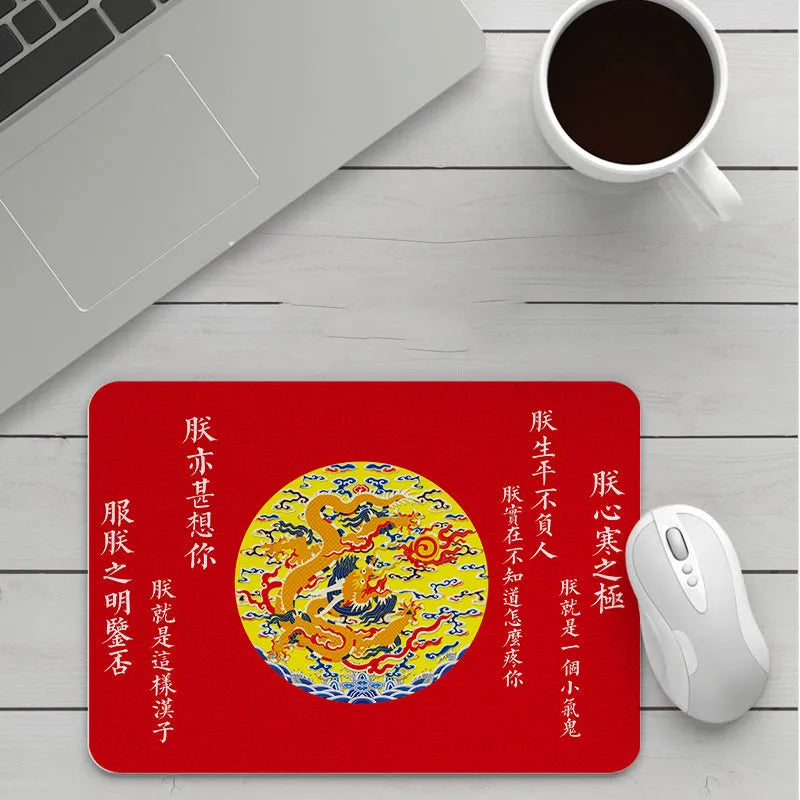 Custom cartoon thickening mouse pad on a desk, showing a colourful design with black stitched edge.