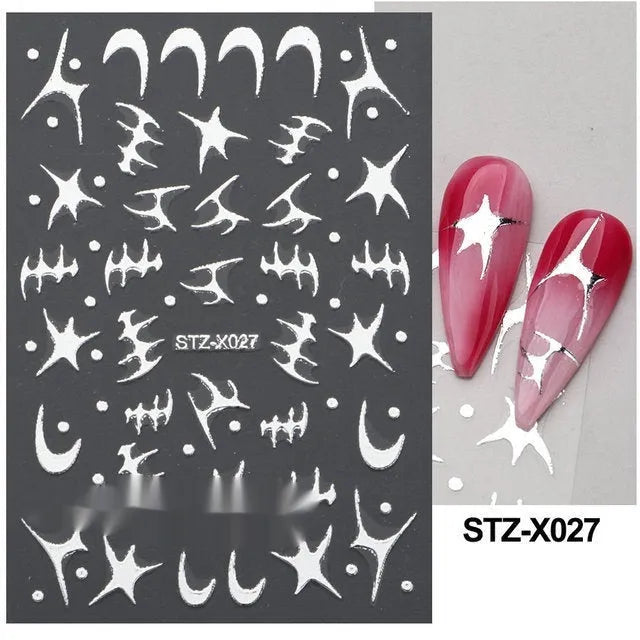 Sheet of black and silver love heart pattern nail art stickers with a plastic nail patch.